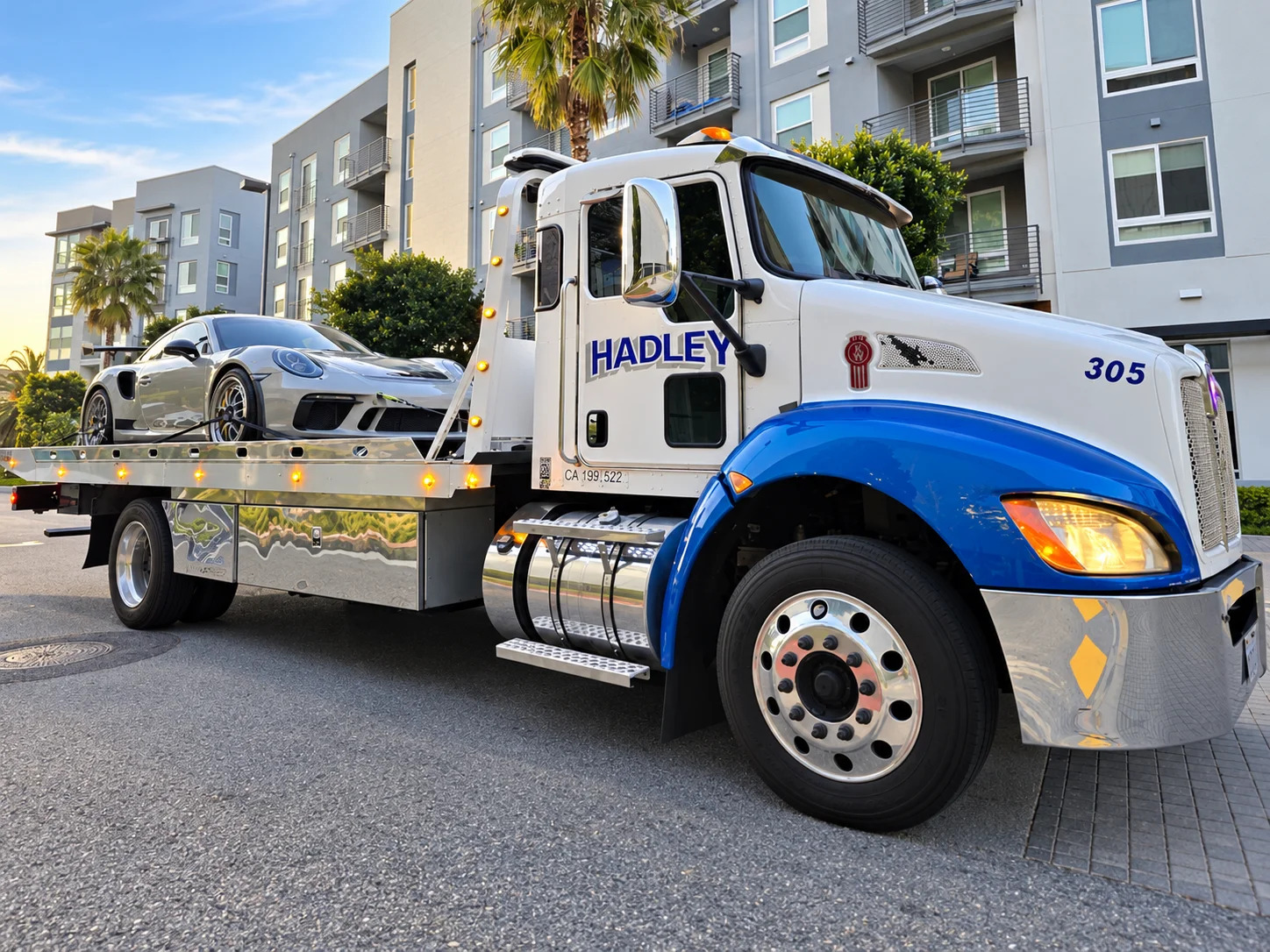 Silver Porsche on Hadley flatbed 305; AI-enhanced from Hadley’s supplied photo