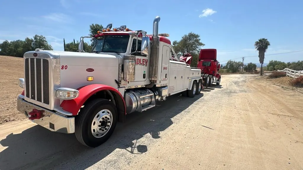 Hadley heavy wrecker towing a semi tractor