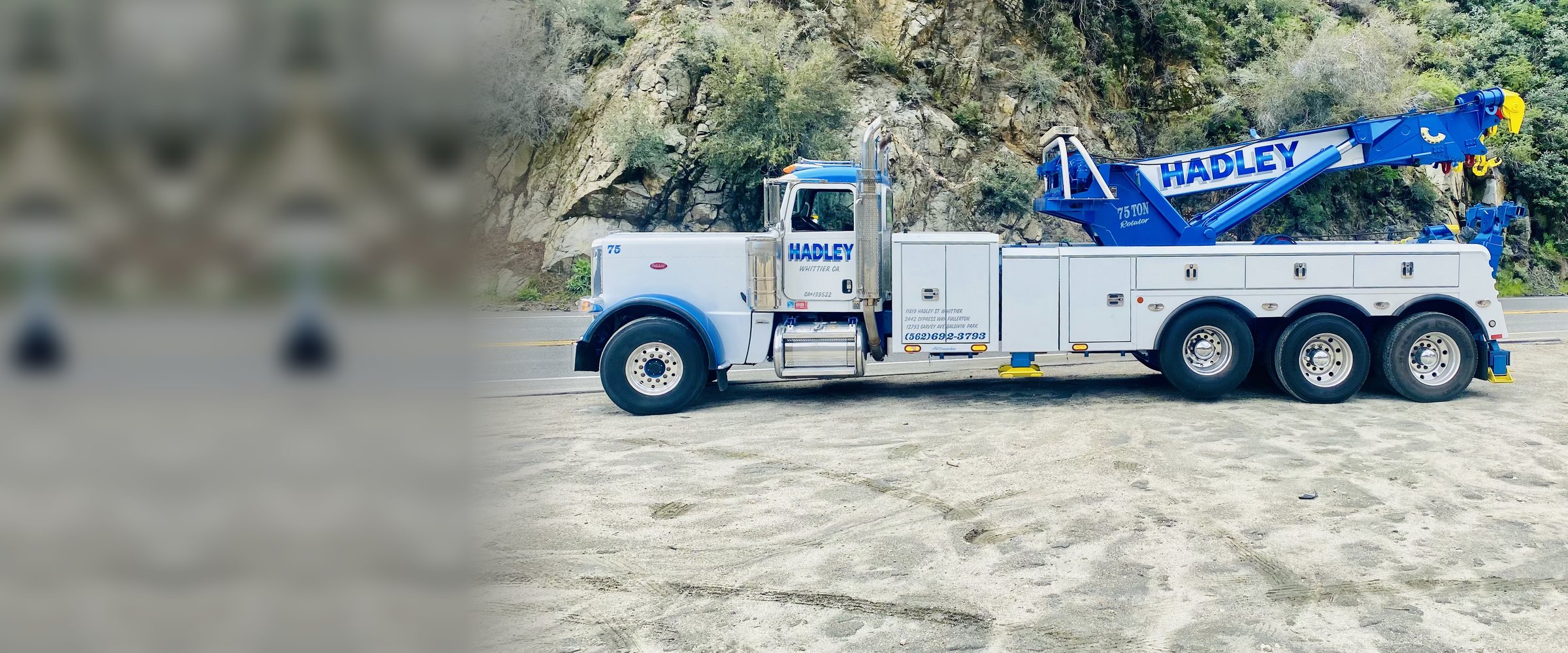 Hadley Tow 75-ton rotator performing a canyon recovery in Southern California